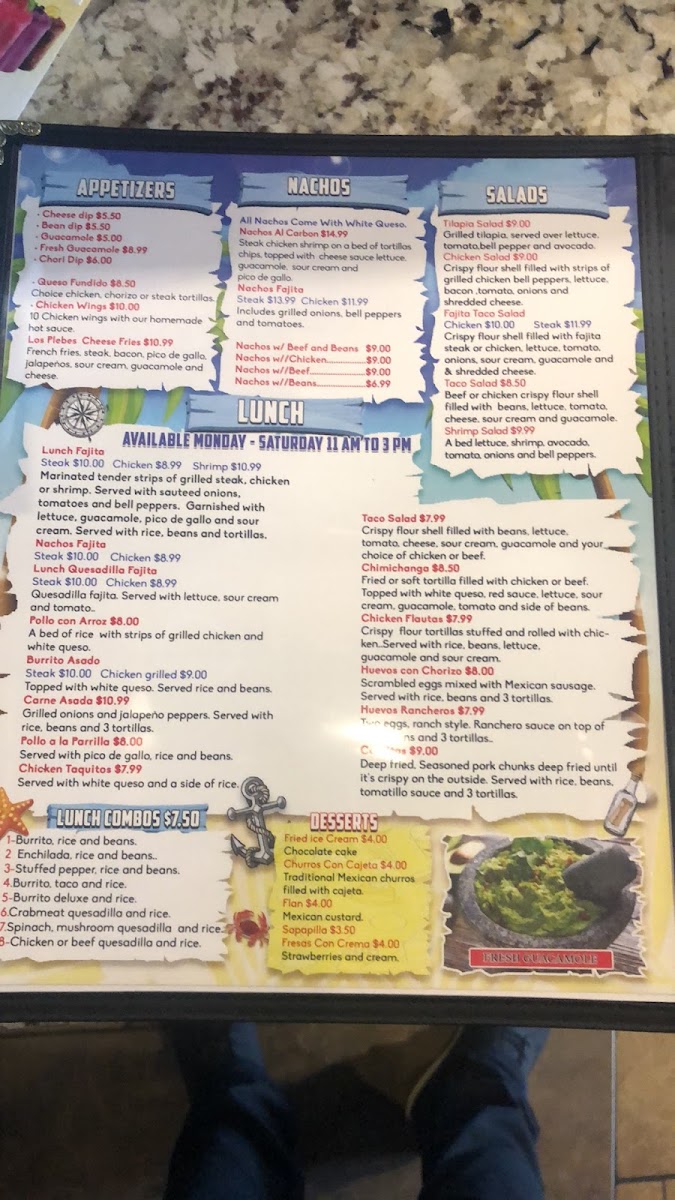 Mariscos Los Plebes menu board