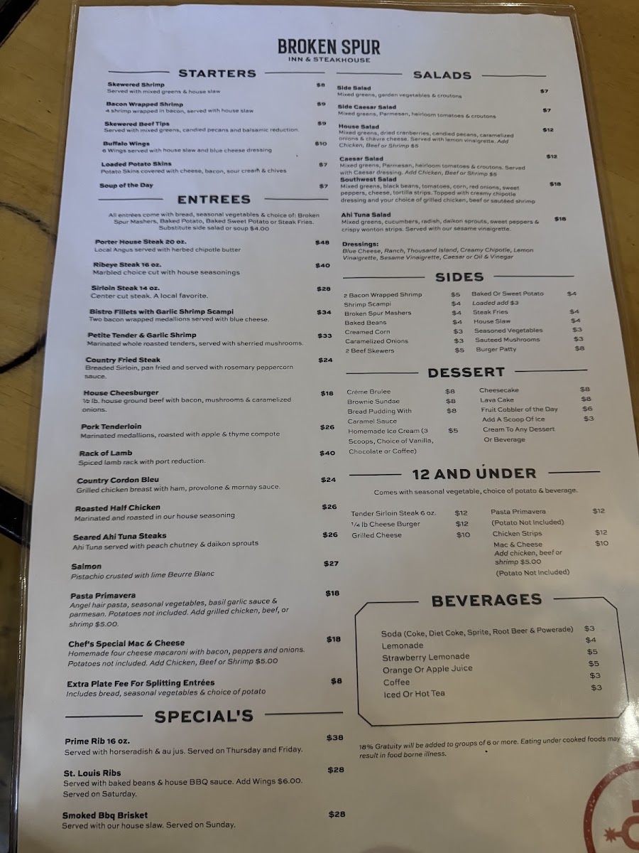 Broken Spur Steakhouse menu board