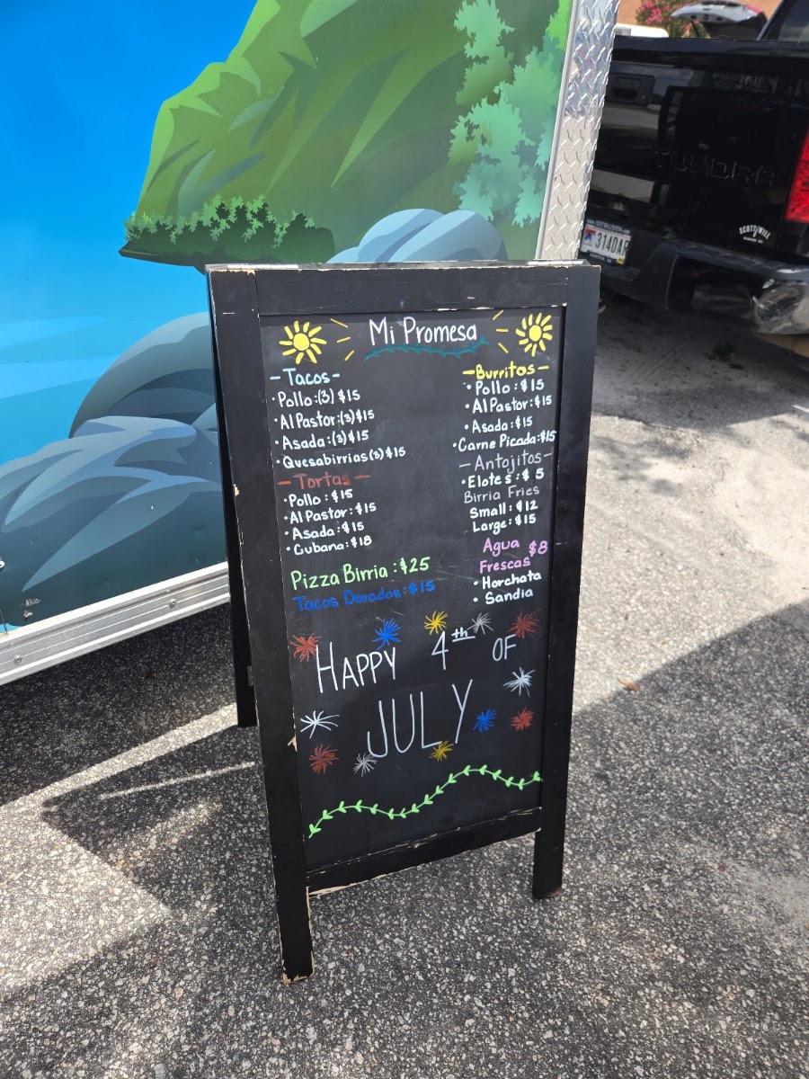 Mi Promesa Authentic Mexican Food menu board