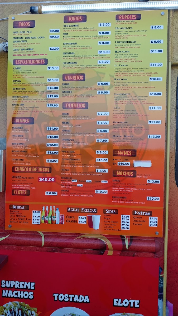 Tacos El Pastorcito Mixe menu board