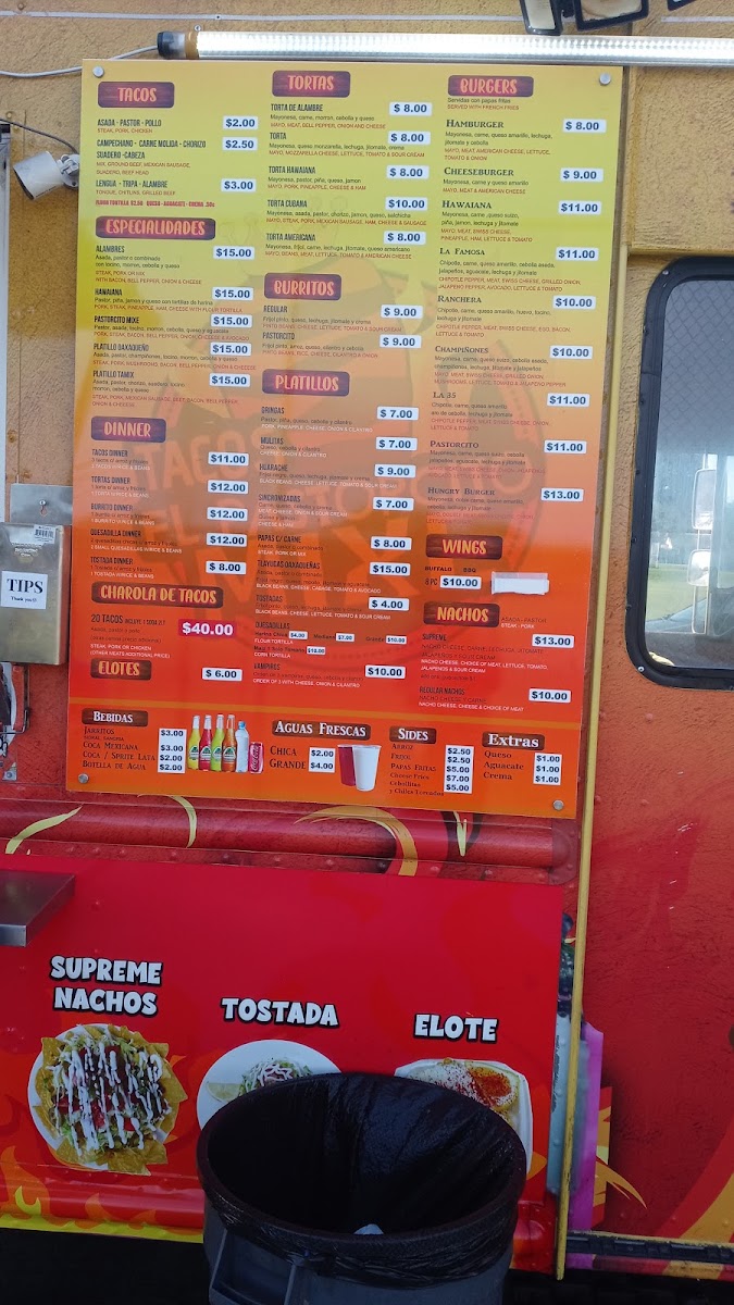 Tacos El Pastorcito Mixe menu board