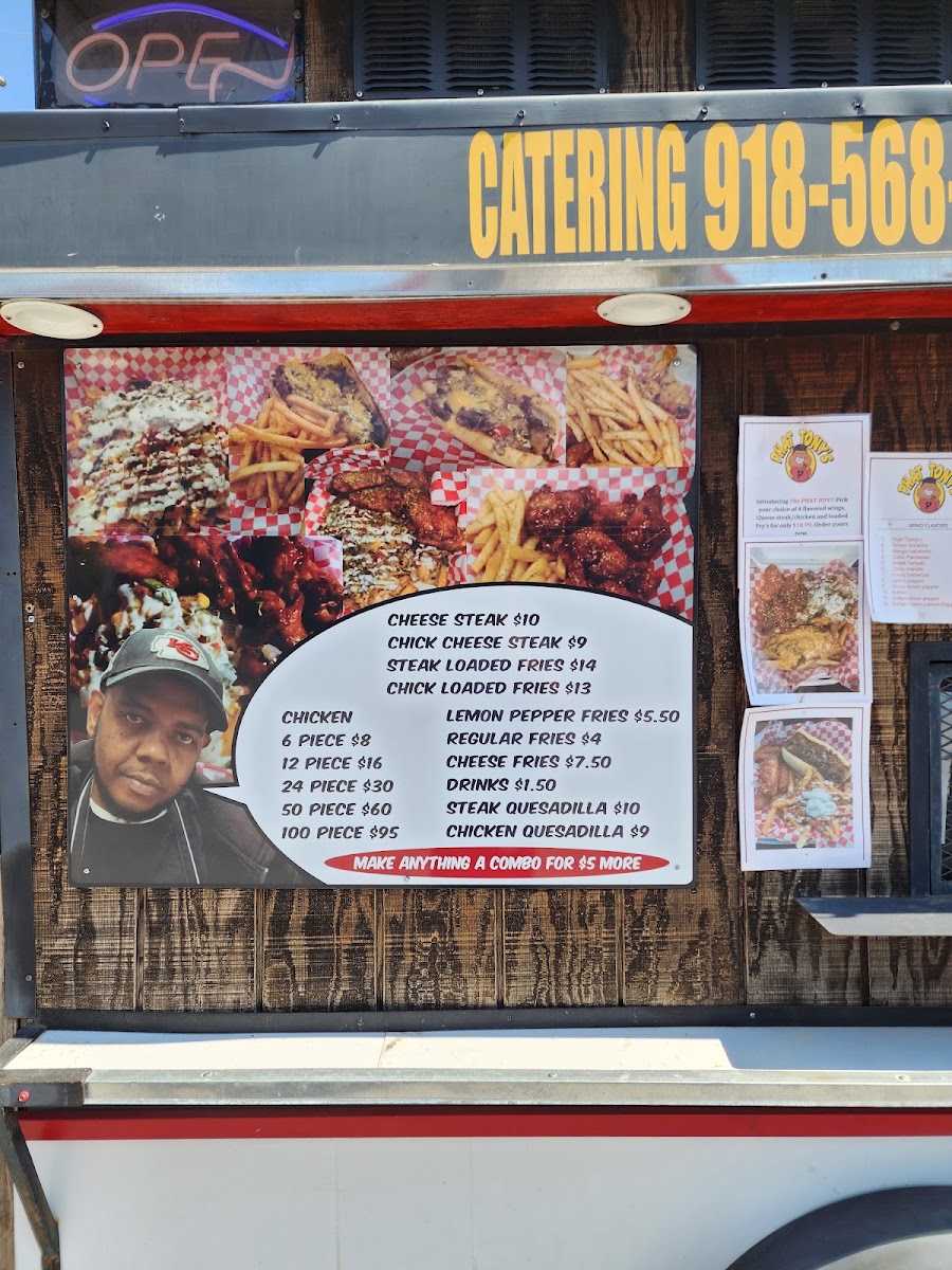 Phat Tony's cheesesteak & Wings menu board