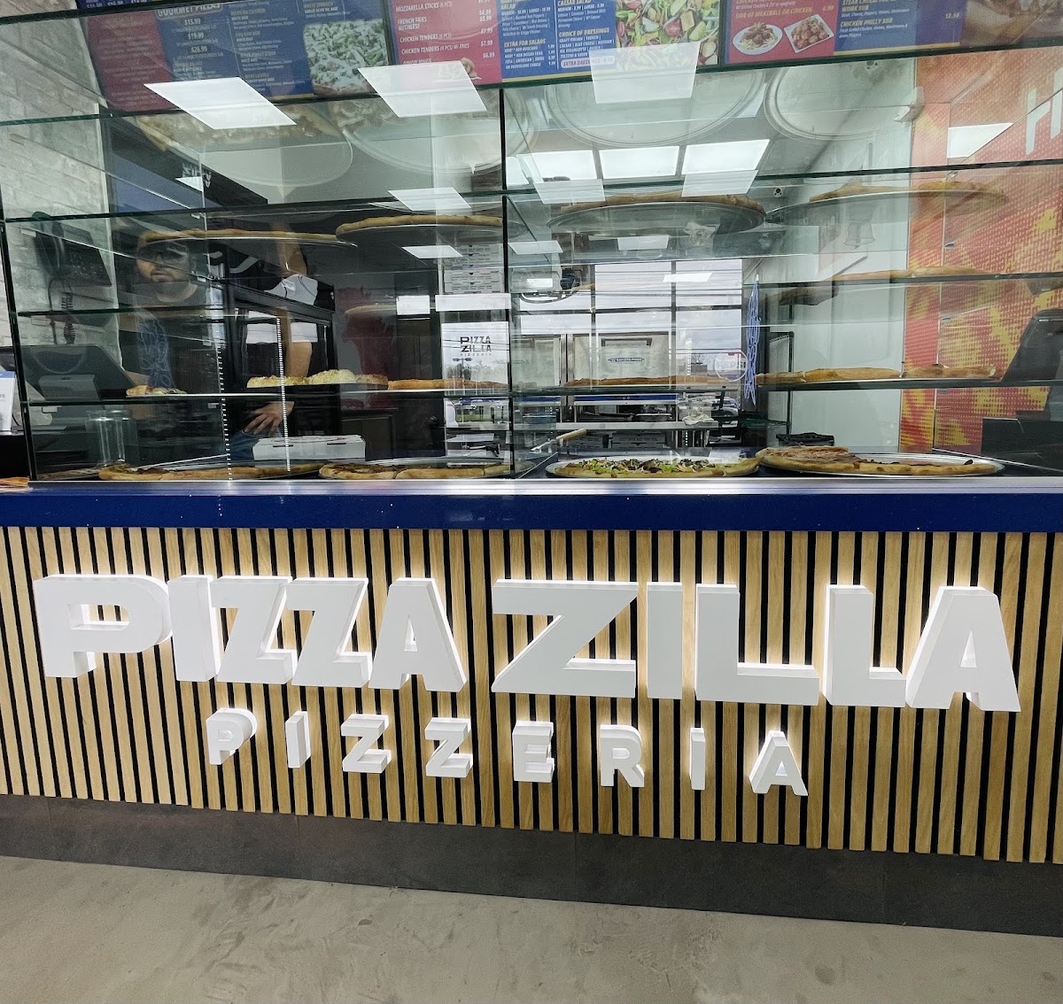 Pizza Zilla menu board