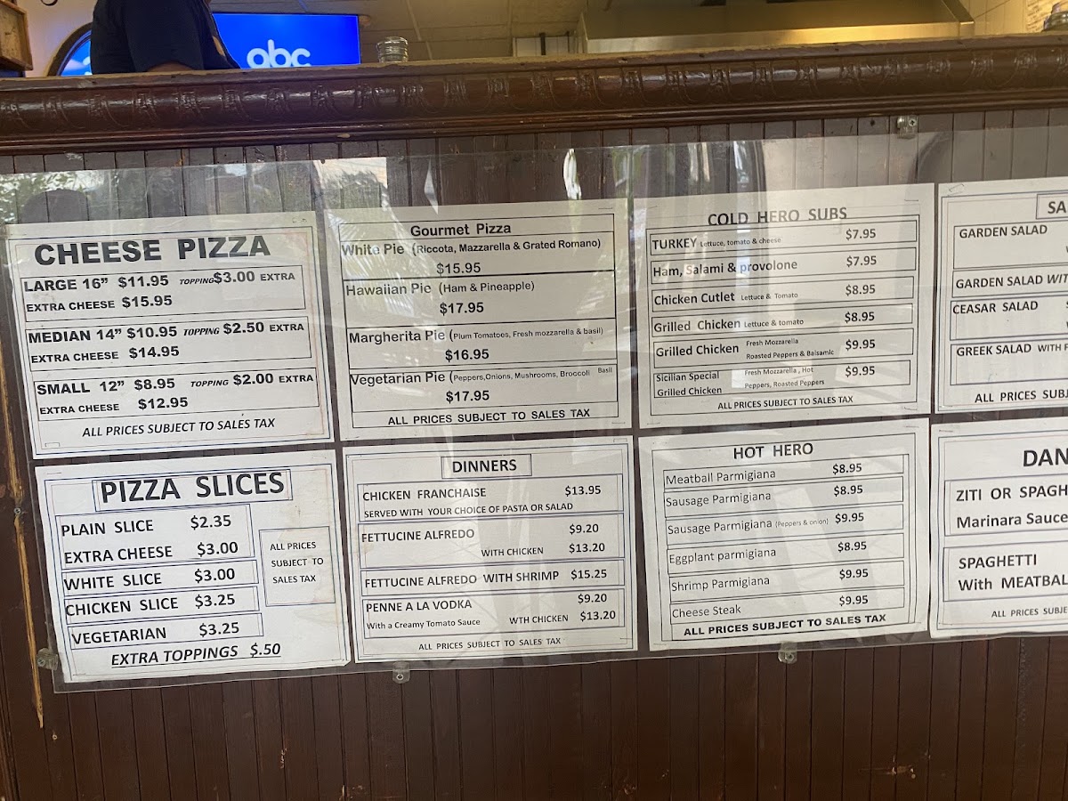 Dantes Pizza & Restaurant menu board